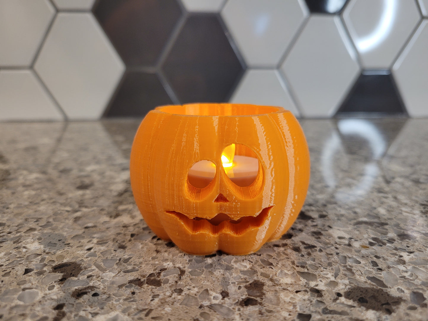 Small pumpkin with tealight